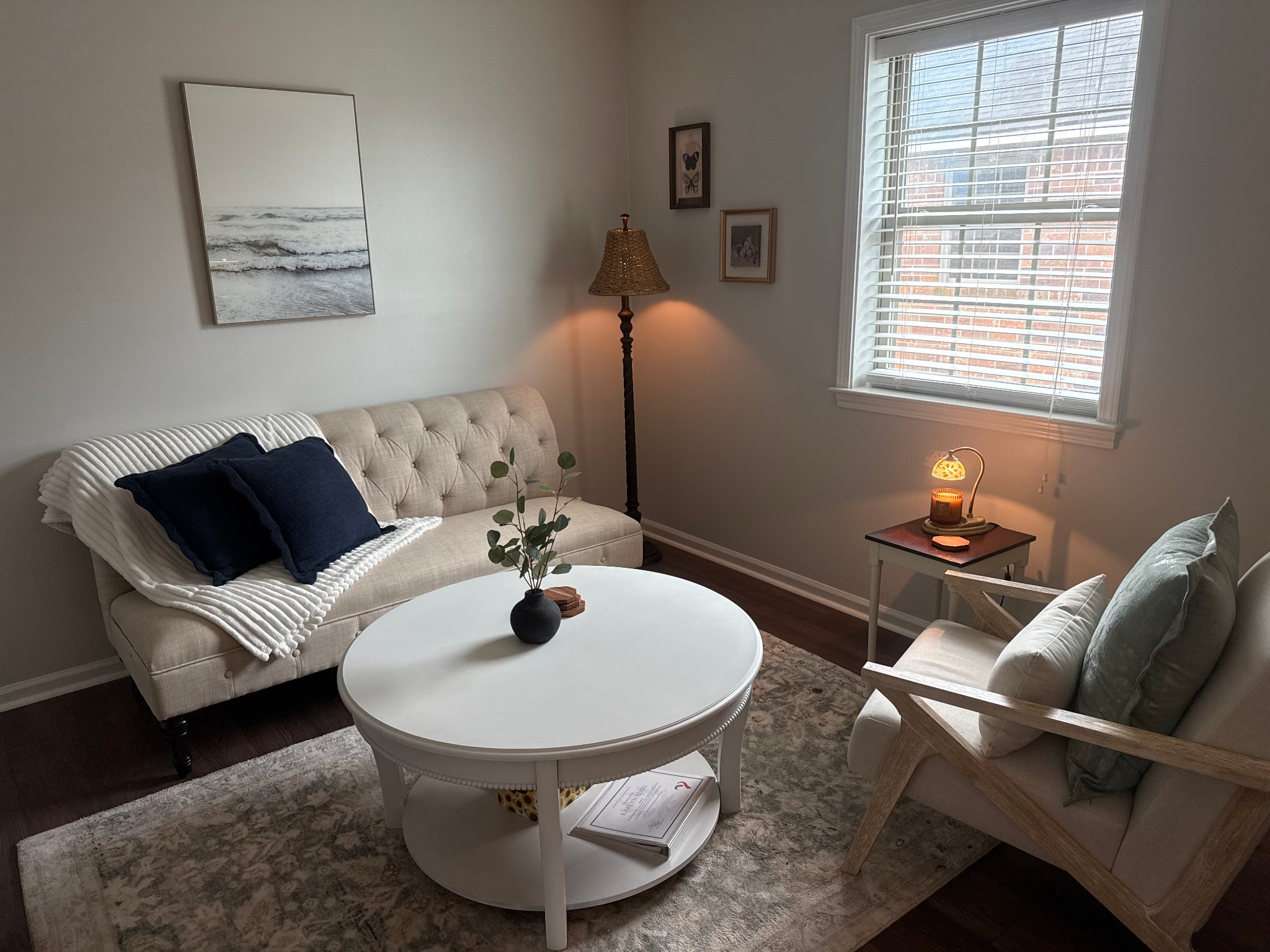 Karlyn Eddy's counseling office — natural light, comfortable chair, and soft lamp